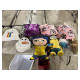 TABLE FULL OF STUFFED ANIMALS