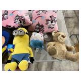 TABLE FULL OF STUFFED ANIMALS