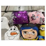 TABLE FULL OF STUFFED ANIMALS