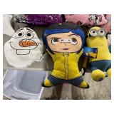 TABLE FULL OF STUFFED ANIMALS