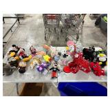 TABLE FULL OF STUFFED ANIMALS