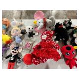TABLE FULL OF STUFFED ANIMALS