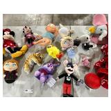 TABLE FULL OF STUFFED ANIMALS