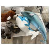 TABLE FULL OF STUFFED ANIMALS