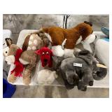 TABLE FULL OF STUFFED ANIMALS