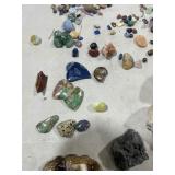 TABLE FULL OF CRYSTALS, GEODES, & ROCKS