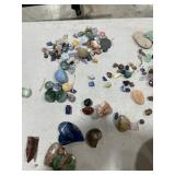 TABLE FULL OF CRYSTALS, GEODES, & ROCKS