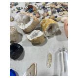 TABLE FULL OF CRYSTALS, GEODES, & ROCKS