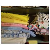 Shelf of Large Cuts Polyester Fabrics