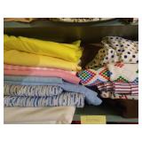 Shelf of Large Cuts Polyester Fabrics