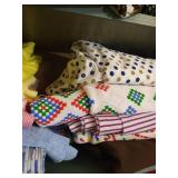 Shelf of Large Cuts Polyester Fabrics