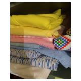 Shelf of Large Cuts Polyester Fabrics