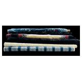 Six Rolls of Fabric
