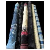 Six Rolls of Fabric