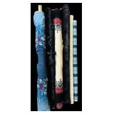 Six Rolls of Fabric
