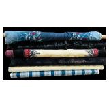 Six Rolls of Fabric