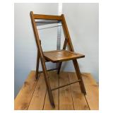 1940s wood slat folding chair stands 32 inches tall, 16 inches wide, all original brass hardware