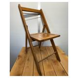 1940s wood slat folding chair stands 32 inches tall, 16 inches wide, all original brass hardware