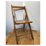 1940s wood slat folding chair stands 32 inches tall, 16 inches wide, all original brass hardware