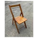 1940s wood slat folding chair stands 32 inches tall, 16 inches wide, all original brass hardware