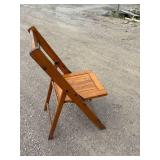 1940s wood slat folding chair stands 32 inches tall, 16 inches wide, all original brass hardware