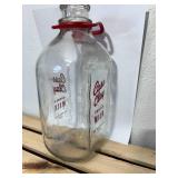 Mid-century modern, vintage, glass half gallon, cast clay grade AA milk, red River valleys, finest bottle with original cork 60 Sweet Court trademark