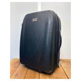 Landor and Hawa midsize suitcase used 24 inches tall two wheel roller, 12 inches deep can expand another 2 inches hard shell wheels in great condition