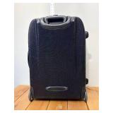 Landor and Hawa midsize suitcase used 24 inches tall two wheel roller, 12 inches deep can expand another 2 inches hard shell wheels in great condition