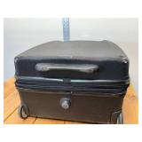Landor and Hawa midsize suitcase used 24 inches tall two wheel roller, 12 inches deep can expand another 2 inches hard shell wheels in great condition