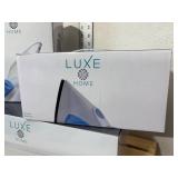 Three new inbox Luxe items, compact steam iron, handheld garment steamer, and three tiered laundry cart.