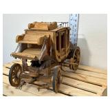 Handmade wooden stage coach, approximately 14 inches long 9 inches high if I had to guess I would say the 1970s