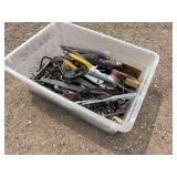 Heavy tools taken out of toolboxes, so toolboxes could be shipped. Wrenches, pliers. 