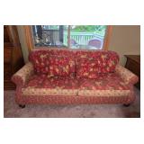 Floral Patterned Sofa with Decorative Cushions