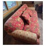 Floral Patterned Sofa with Decorative Cushions