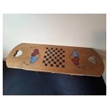 Wooden Bench with Checkerboard Design and Heart Cutouts