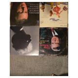 Collection of Vinyl Records featuring Various Artists and Genres