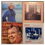 Collection of Vintage Vinyl Records Featuring Various Artists