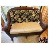 Wicker Loveseat with Floral Cushions