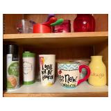 Assorted Kitchenware Collection with Mugs, Measuring Cups, and More