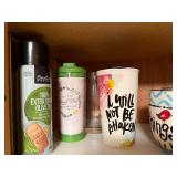 Assorted Kitchenware Collection with Mugs, Measuring Cups, and More