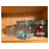 Kitchenware Set with Baking Trays, Glass Canisters, and Strainer