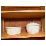 Assorted Kitchenware Collection Including Mugs, Bowls, and Bakeware