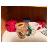 Assorted Kitchenware Collection Including Mugs, Bowls, and Bakeware