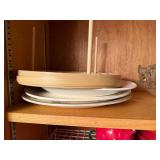 Set of Assorted Kitchenware Including Plates, Bowls, and Glasses