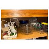 Collection of Kitchenware including Mixing Bowls, Electric Knife, and Storage Containers