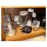 Collection of Kitchen Appliances Including Blender and Food Processor