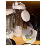 Collection of Kitchen Appliances Including Blender and Food Processor