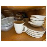 Assorted Collection of Kitchenware including Plates, Bowls, and Plastic Containers