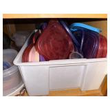 Assorted Collection of Kitchenware including Plates, Bowls, and Plastic Containers