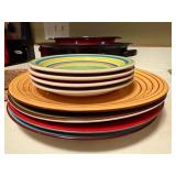 Enamel Roasting Pans with Tongs and Colorful Dining Plates